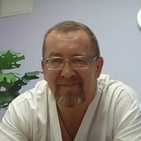 Мастер массажа Евгений